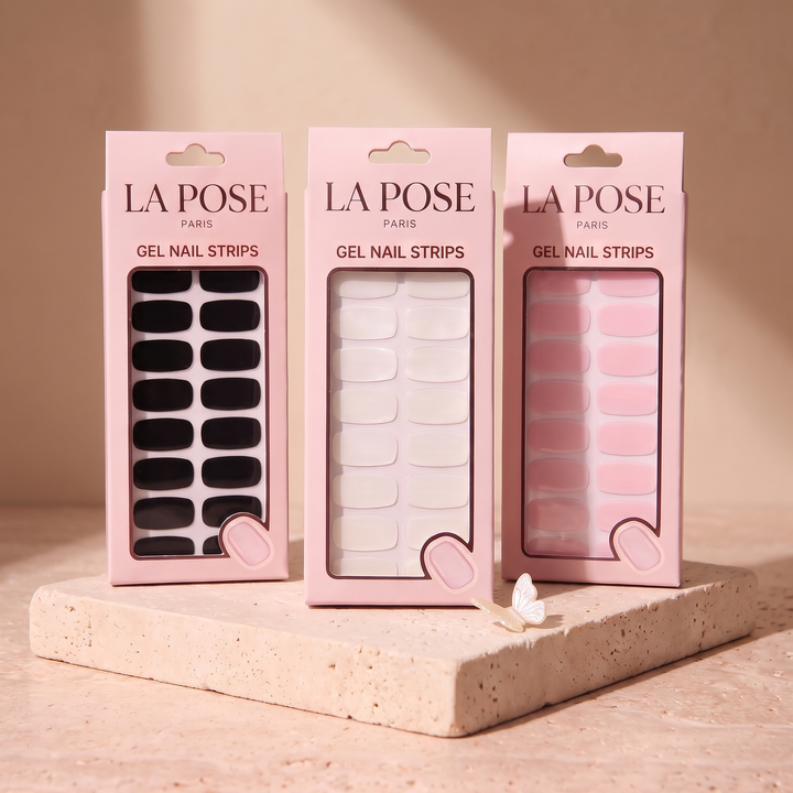 Trois boîtes de gel La Pose sur une pierre aux tons chauds